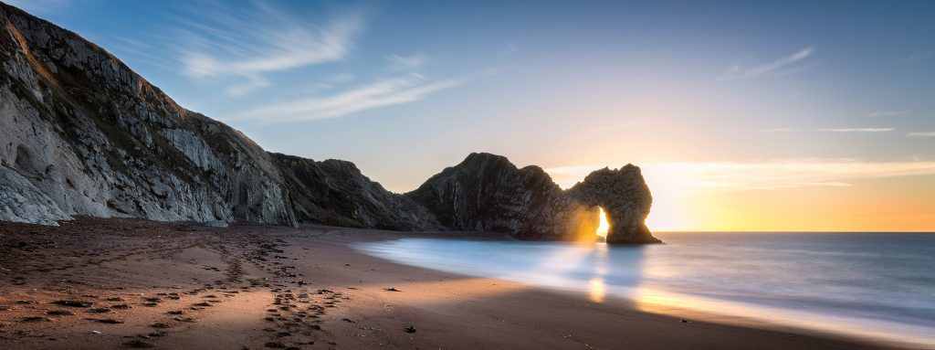 Durdle Door arch at sunset